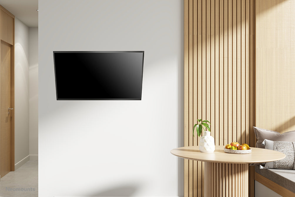 Neomounts Wandhalterung – neigbar – 10–30" – VESA 75×75–100×100 – bis 25 kg – NM-W60BLACK
