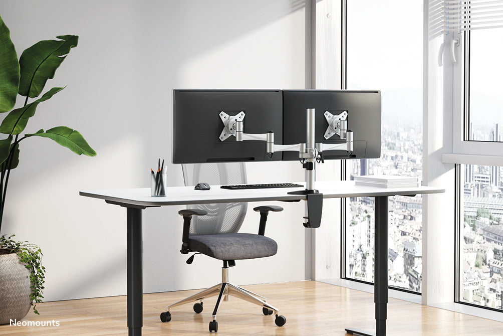 Neomounts Monitorarm, Dual, Tischklemme/Tischdurchführung, bis 27", VESA 75 × 75/100 × 100 mm, 9 kg, silber