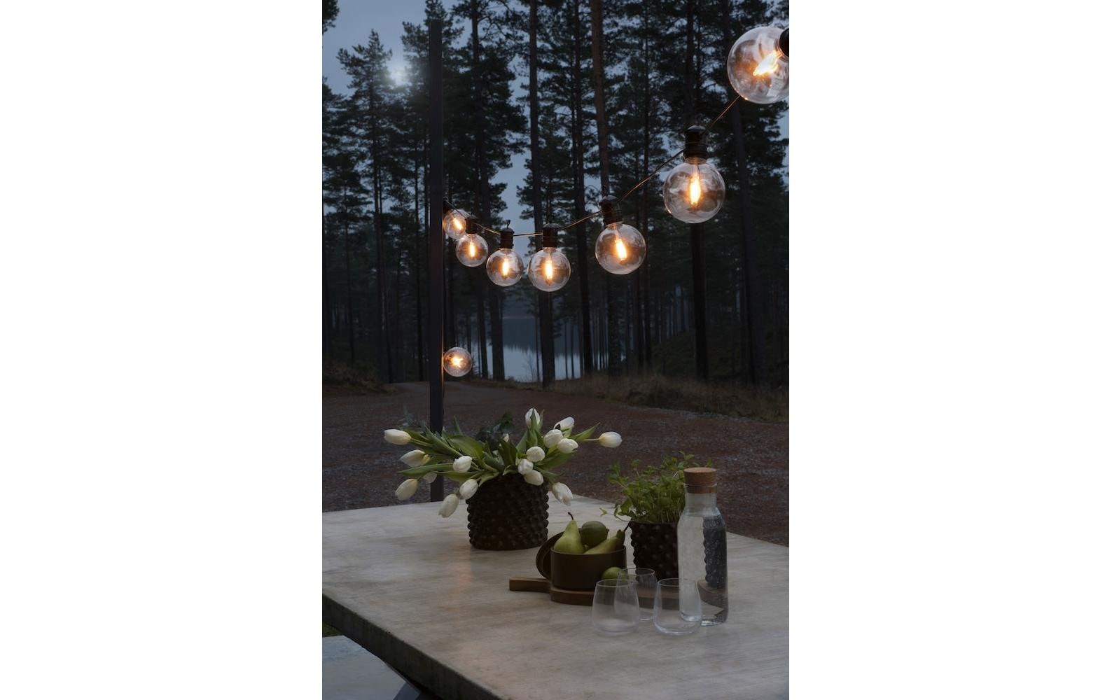 Konstsmide Lichterkette 9,15 m – Bernstein, 10 LEDs, dimmbar, IP44 – 1 Stk., Schwarz/Transparent – 2395-800