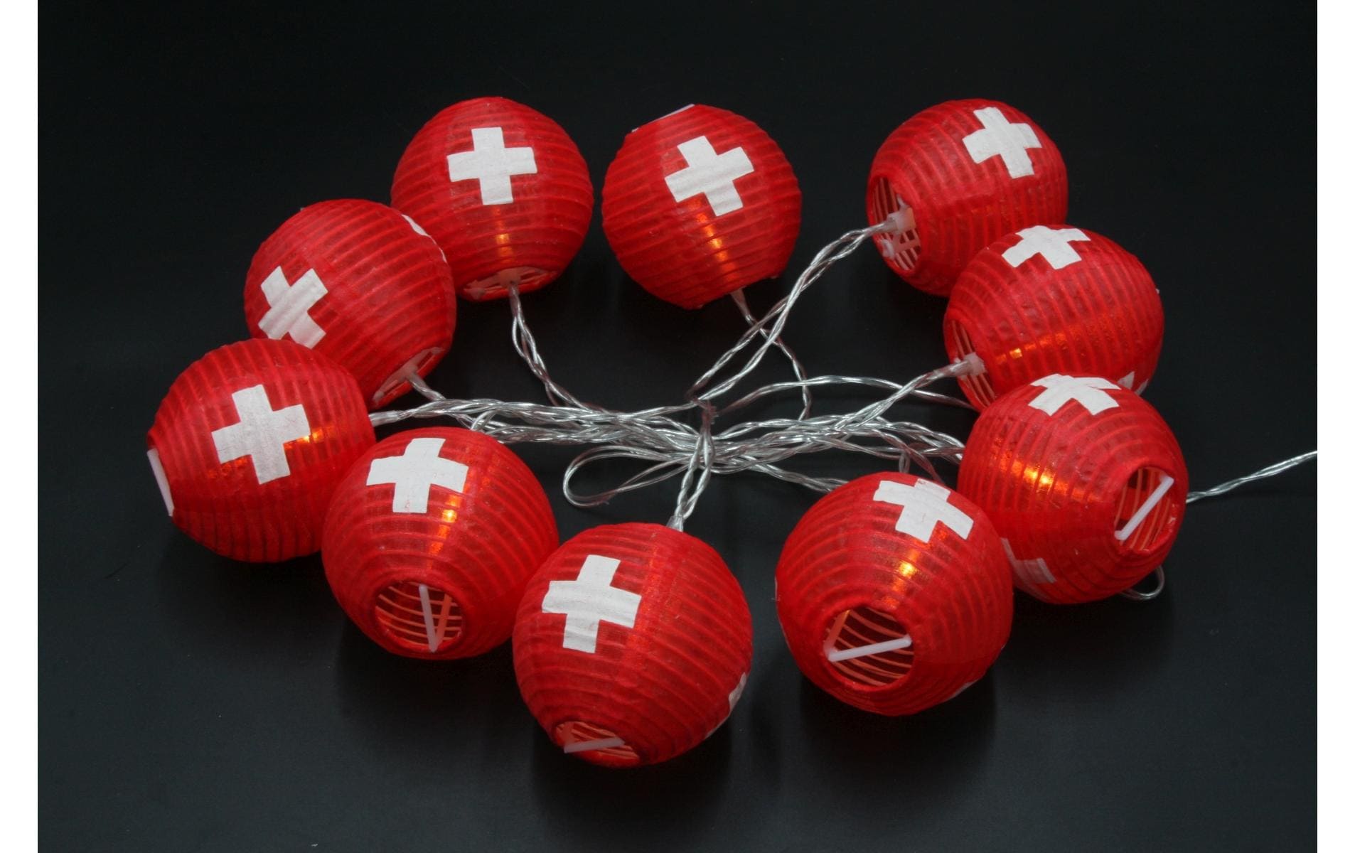 Dameco Lichterkette CH-Kreuz 6er-Set – 1,8 m – 10 LEDs, Warmweiss – Solarbetrieb – Nylon, Rot/Weiss