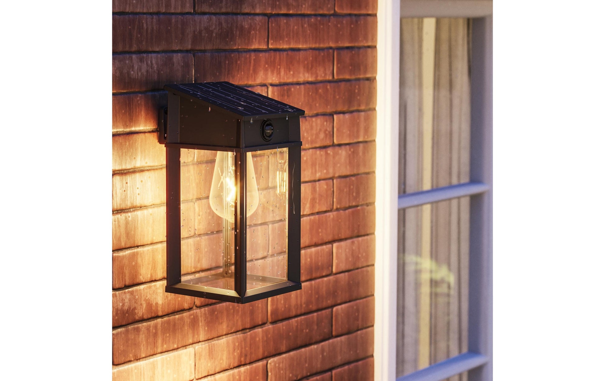 Philips Aussenwandleuchte – Warmweiss, 2700 K – IP44 – Solarbetrieb – mit Bewegungsmelder – Schwarz, Metall