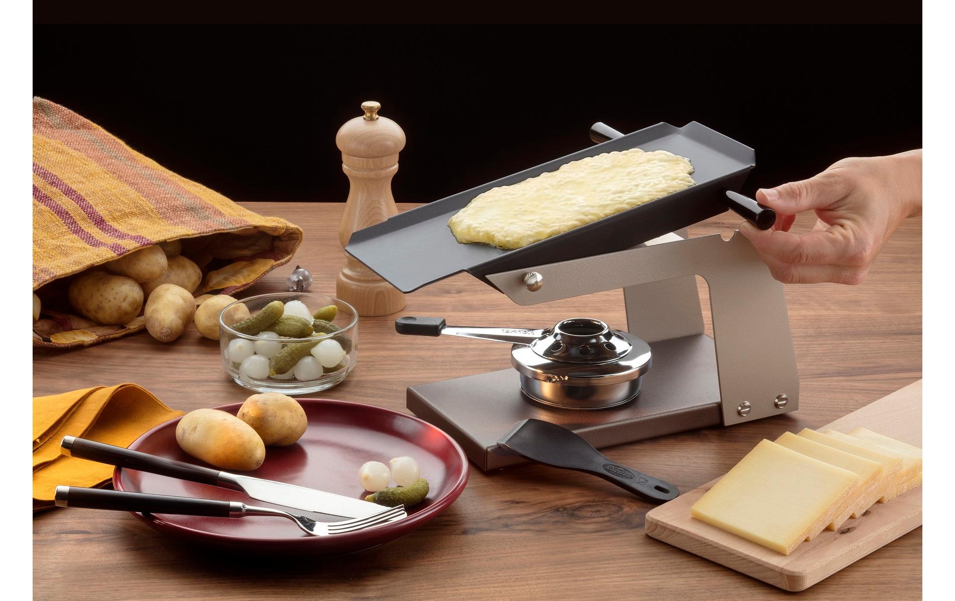 TTM Raclette Racly 100.021 – 2 Käsehälften, Aluminiumplatte – schwarz/braun