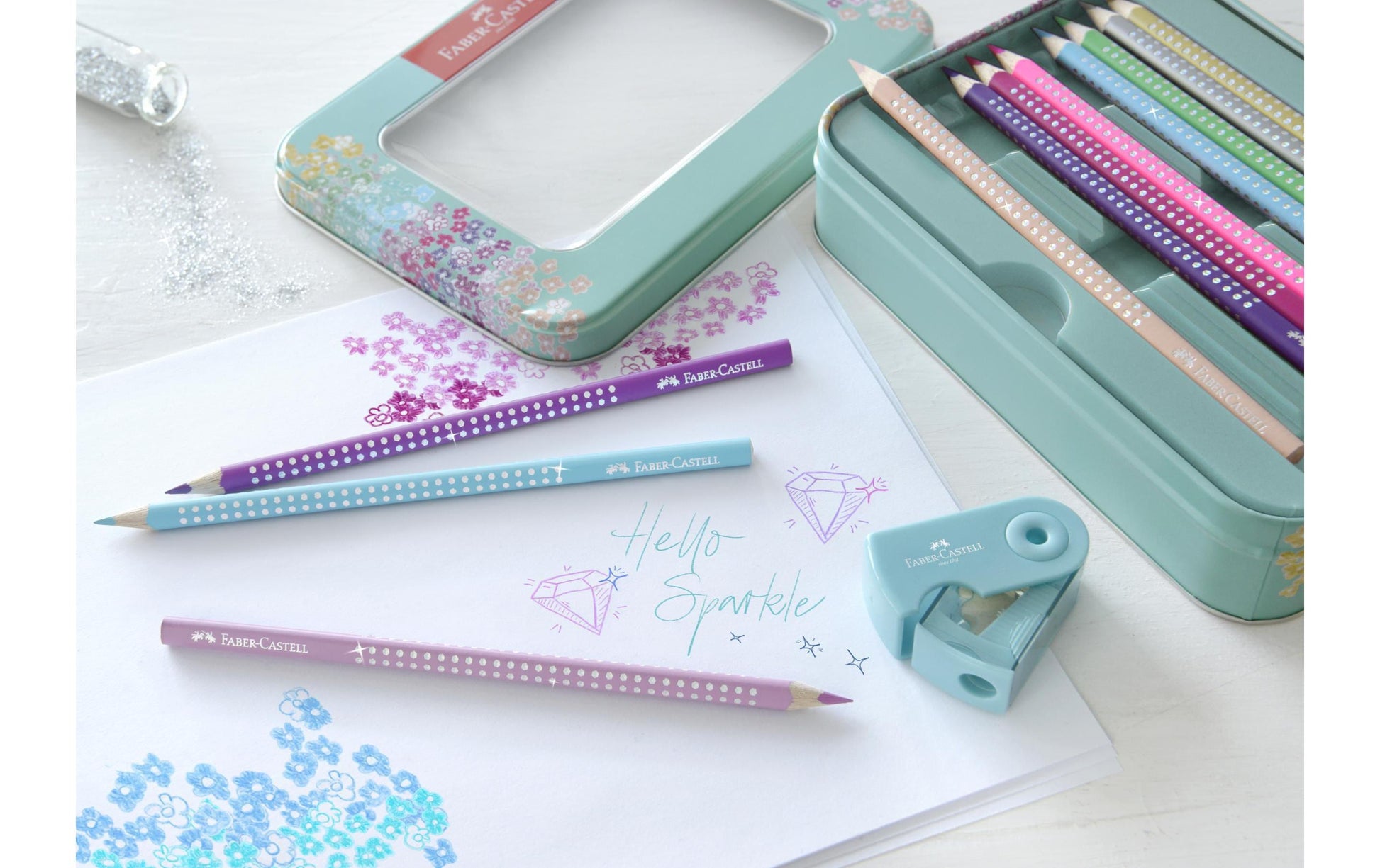 Faber-Castell Aquarellfarbstifte Grip Sparkle – 20 Farben, im Metalletui, mit Spitzer, Ø 3 mm, dreikantig, FSC
