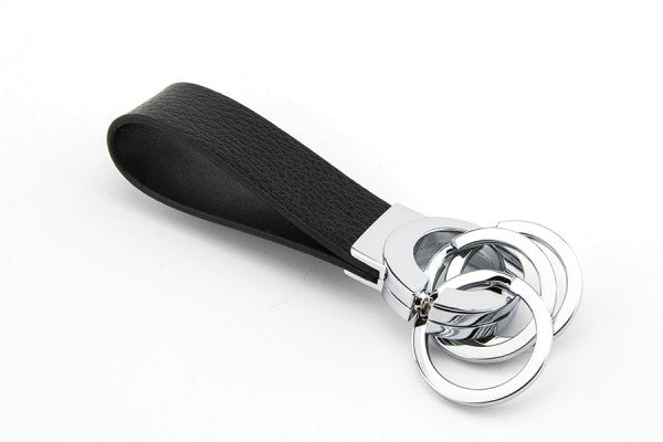 TROIKA Key Click Schlüsselanhänger – Leder, Schwarz/Silber, Ø 30 mm