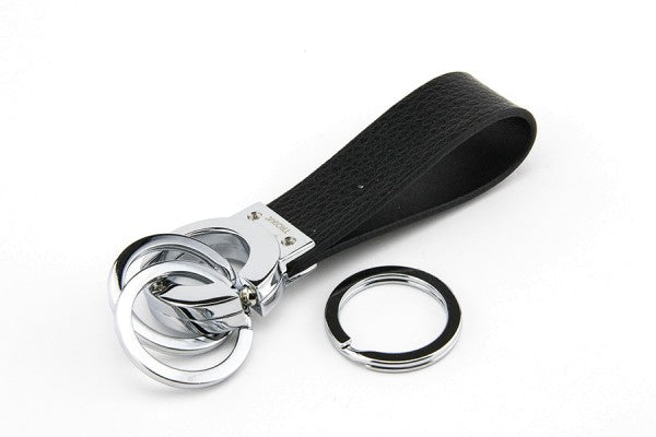 TROIKA Key Click Schlüsselanhänger – Leder, Schwarz/Silber, Ø 30 mm
