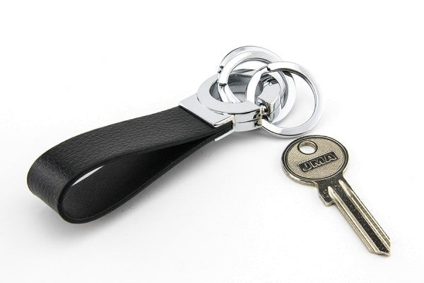 TROIKA Key Click Schlüsselanhänger – Leder, Schwarz/Silber, Ø 30 mm