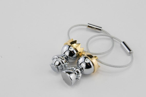 TROIKA Schlüsselanhänger Little King & Queen – Gold/Silber, 90 × 23 mm, 2er-Set