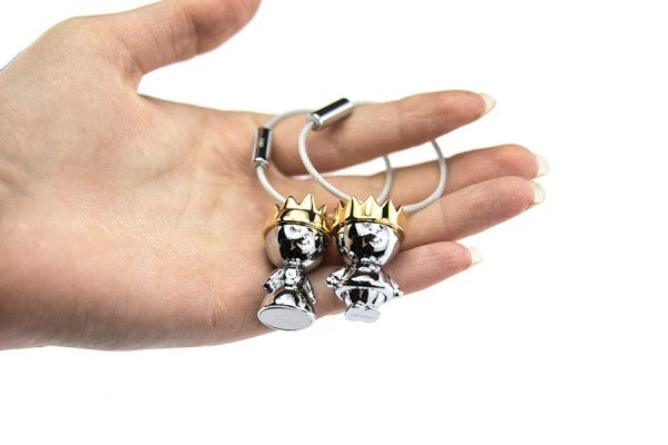TROIKA Schlüsselanhänger Little King & Queen – Gold/Silber, 90 × 23 mm, 2er-Set