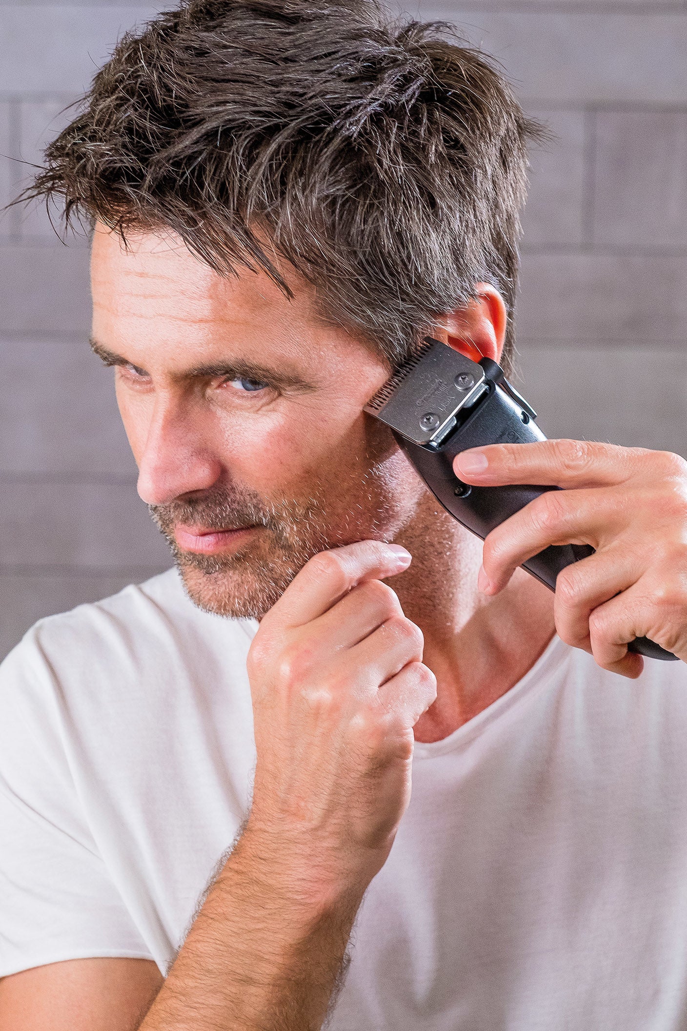 Wahl Haarschneider – Li‑Ion, 90 min Akku, 1–25 mm, 8 Kämme, schwarz/silber