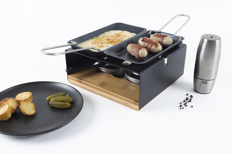 Stöckli Raclette-Grill Multifun – 2 Pastenbrenner, teflonbeschichtet, Metall/Bambusholz – Schwarz/Holz
