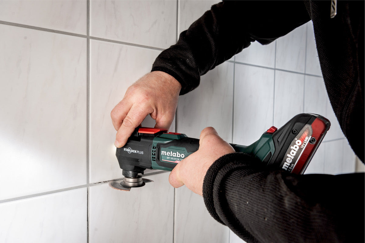 Metabo Akku-Multifunktionswerkzeug Solo – MT 18 LTX BL QSL, 18 V, Schwarz/Orange