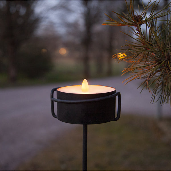Star Trading LED-Teelicht Maxi – Ø 10 cm – Warmweiss – Batteriebetrieben – Timer 6/18 h, flackernd – Schwarz