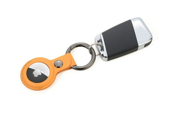 TROIKA Schlüsselanhänger für AirTag – Kunstleder, Orange, 88 × 40 × 8 mm