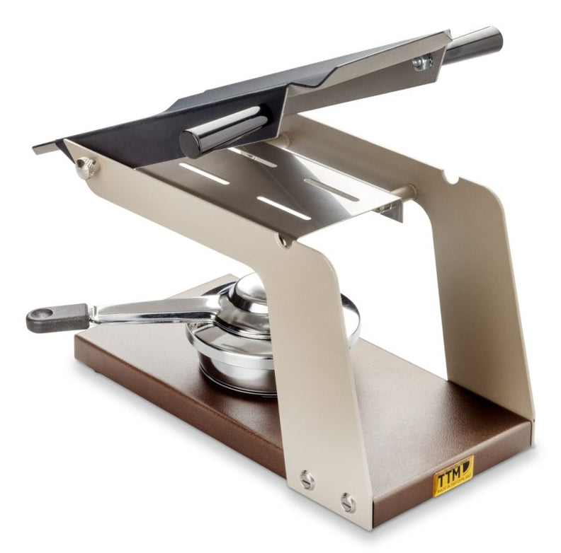 TTM Raclette Racly 100.021 – 2 Käsehälften, Aluminiumplatte – schwarz/braun