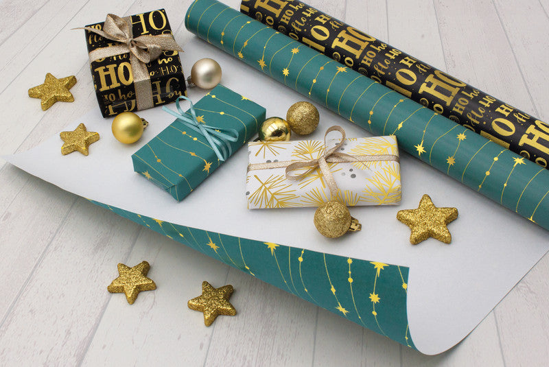 Braun + company Geschenkpapier – X-mas Letters – seidenmetallisiert – 700 × 2000 mm – schwarz/gold